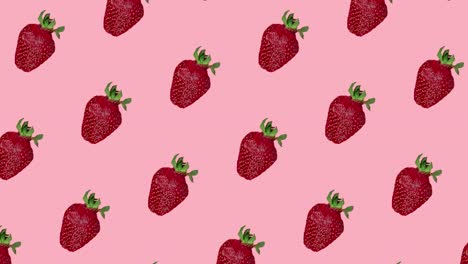patrón de animación de bucle sin costuras de fresas rojas en un fondo rosado. hermosas bayas jugosas es un concepto de cosecha y verano. plantilla para publicidad con espacio de copia