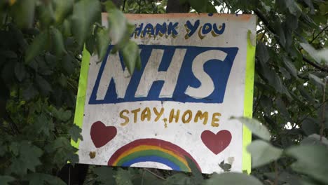 Handmade thank you to NHS and stay at home sign zoom in shot