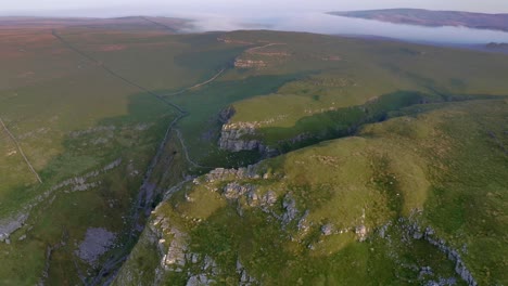 drone footage of limestone pavement above malham, yorkshire dales national park.uk