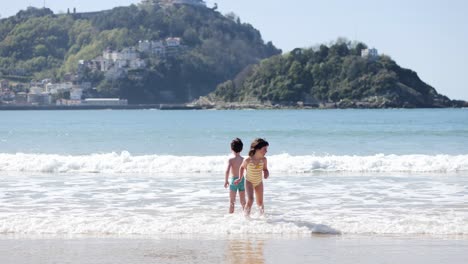 happy children on wet coast