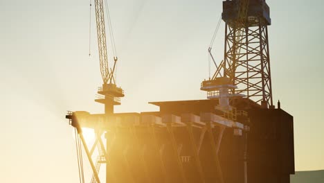 Image-of-oil-platform-while-cloudless-day.