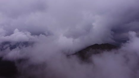 clouds over the mountains flying with drone