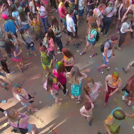 people during holi festival celebrations. vinnitsa, ukraine - july 2017: people throwing colorful paint and powder during holi festival celebrations