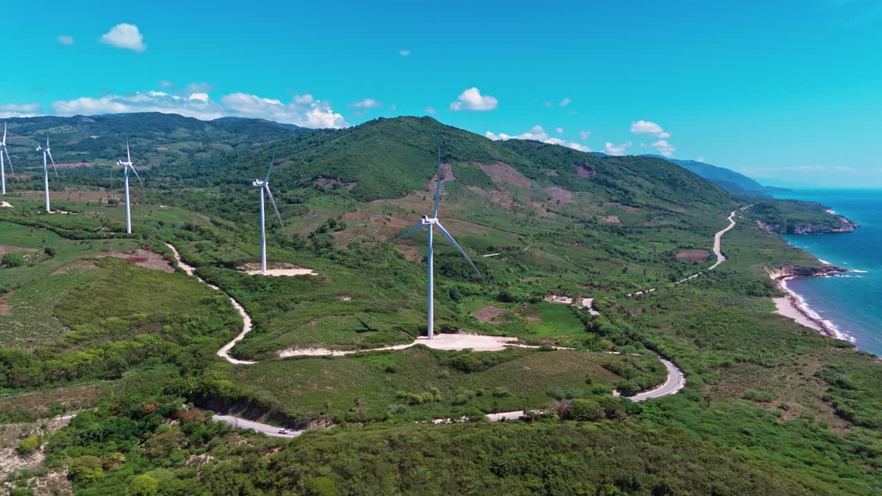 Wind Turbines On The Mountain On A Sunny Day - Electricity From Wind In Barahona, Dominican Republic. - aerial shot