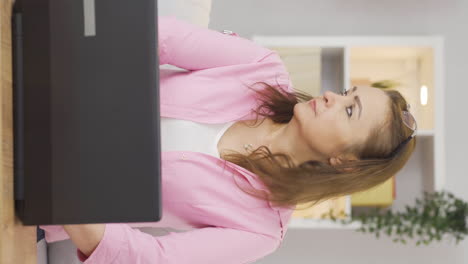 Vertical-video-of-The-woman-who-turned-off-the-lights.-Energy-saving.