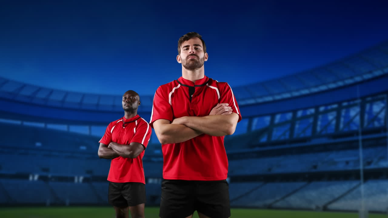 프로 럭비 선수 들 이 경기장 앞 에 서 있다