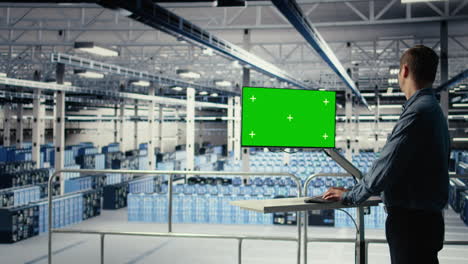 server farm programmer using green screen computer to scan hardware rigs