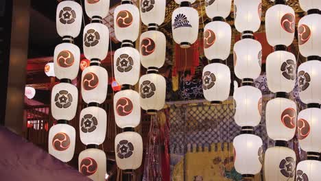 traditional japanese lanterns with crests and symbols