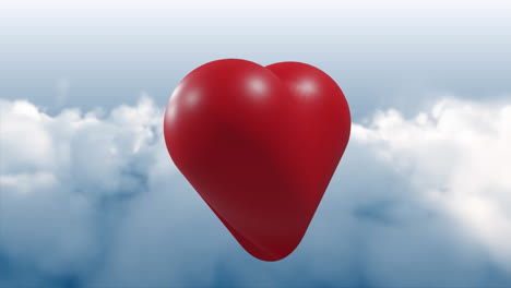 animación de corazón rojo sobre el cielo con nubes.