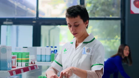 pharmacist preparing medicaments order