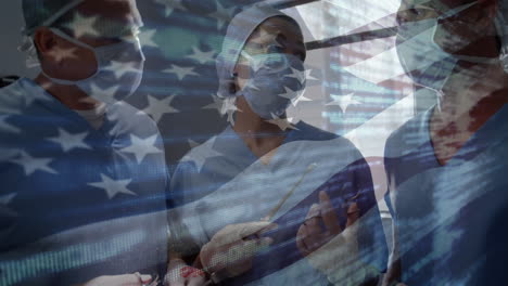 animación de la bandera de los estados unidos ondeando sobre los cirujanos en el quirófano