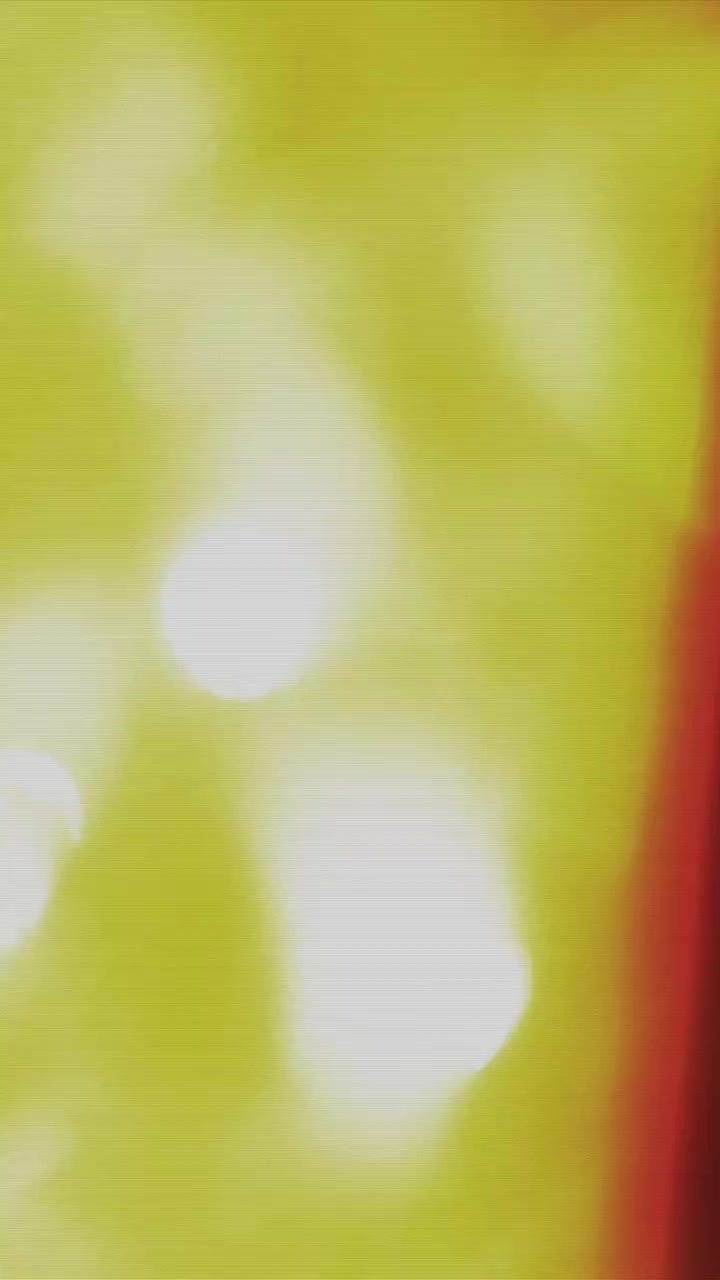 Abstract Light Leaks and Color Transitions on Dark Background