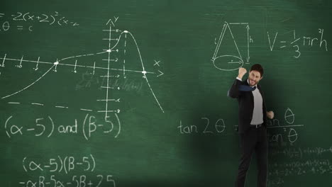 man in front of moving maths on blackboard