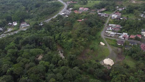 Aerial shot of village with simple settlement far from city near Amazon jungle
