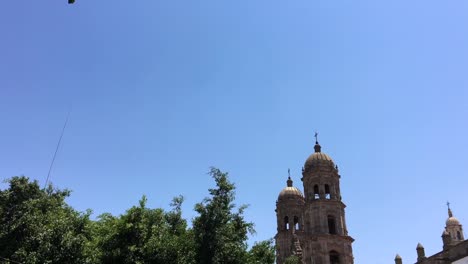 Basilica-of-Our-Lady-of-Zapopan,-Guadalajara,-Mexico,-ground-level-view-reveal