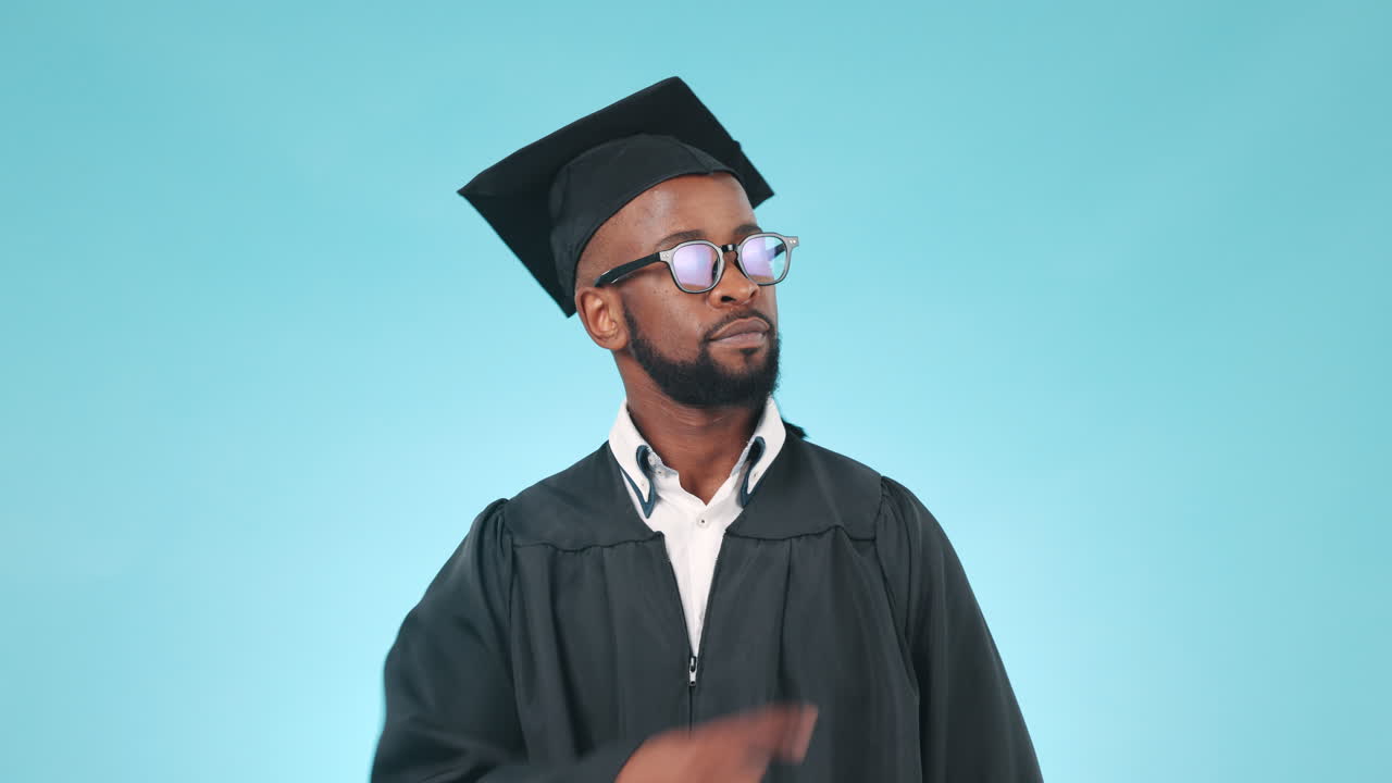Pointing, smile and face of man graduate