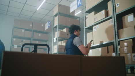 warehouse workers handling and sorting packages