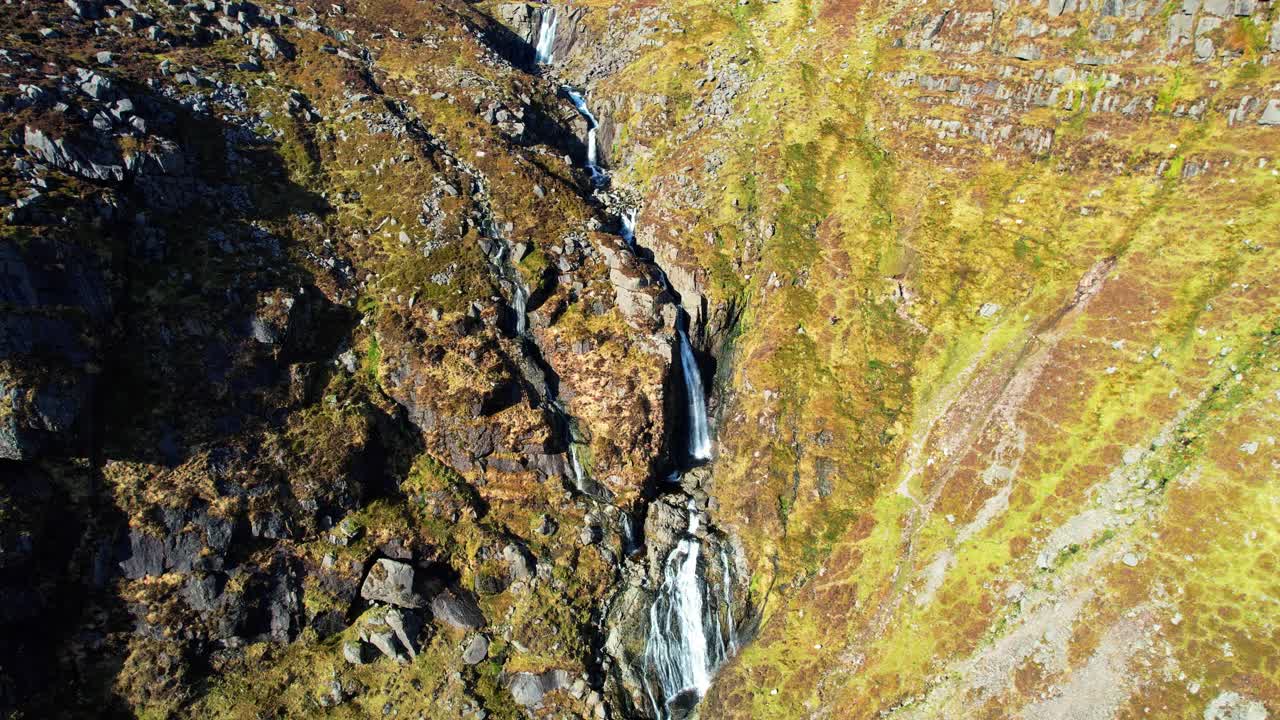 water cascading down The Mahon falls Comeragh Mountains Waterford Ireland in winter