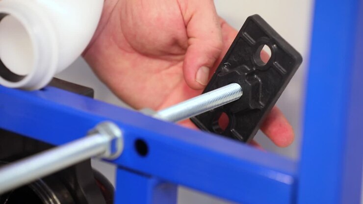 master places the material on the bolt