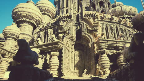 a grand and intricate stone castle with an ornate doorway