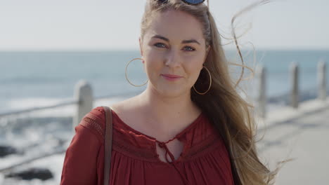 portrait beauitful young blonde woman laughing enjoying vacation successful female on sunny ocean seaside wind blowing hair slow motion