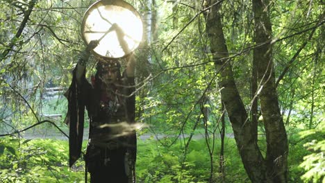 shaman holds the drum overhead