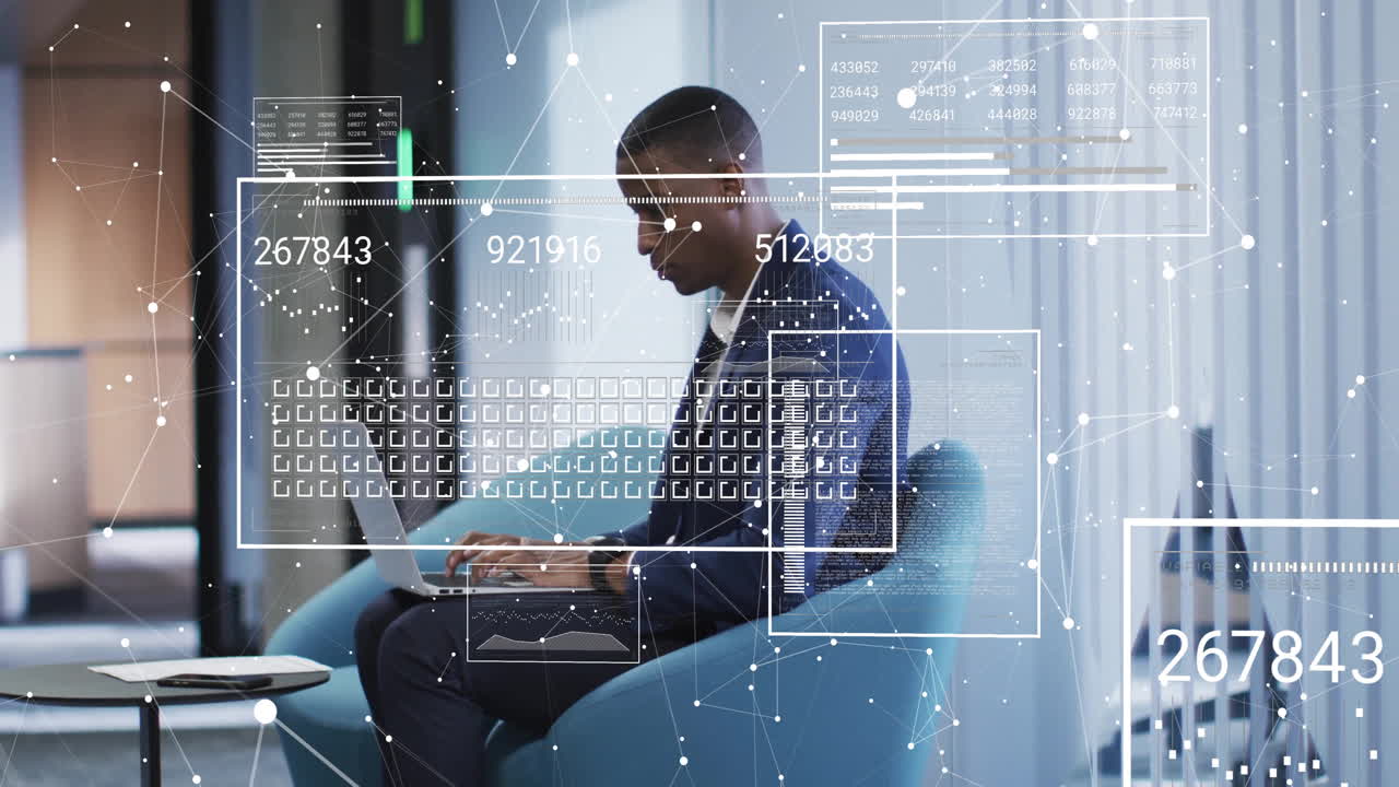 Animation of digital data processing over african american businessman using laptop in office