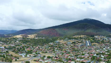 hobart city skyline with mount wellington mountain view, 4k drone tasmania slow motion