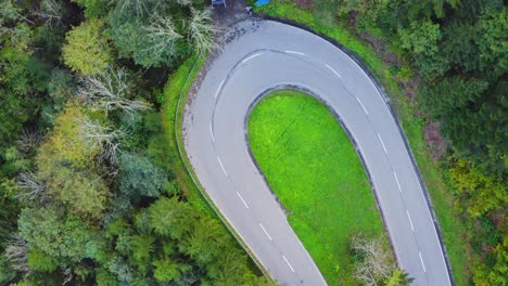 Aerial-Top-Down-View-Of-Scenic-Empty-Windy-Road-In-Forest-Landscape