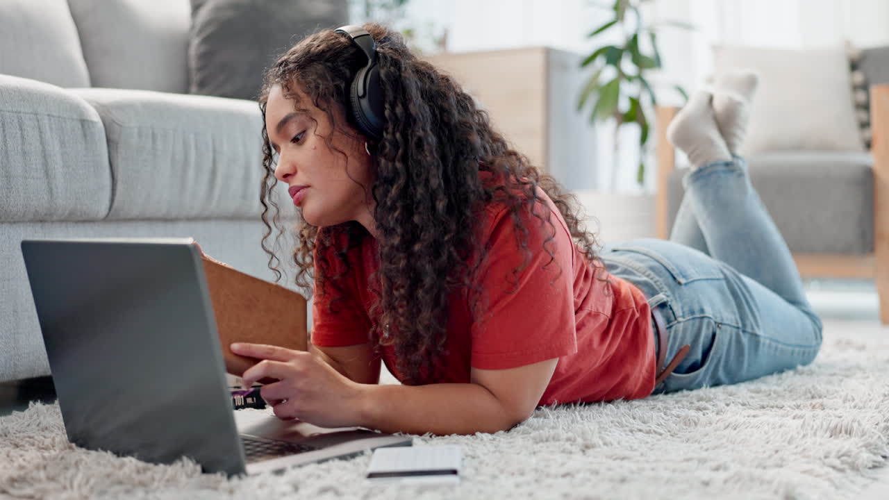 E learning, laptop and woman writing in book