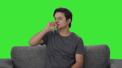 tired and lazy indian man yawning green screen