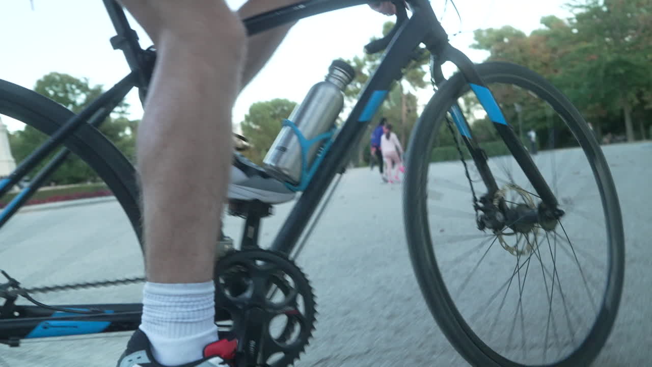 Person Cycling in a Park