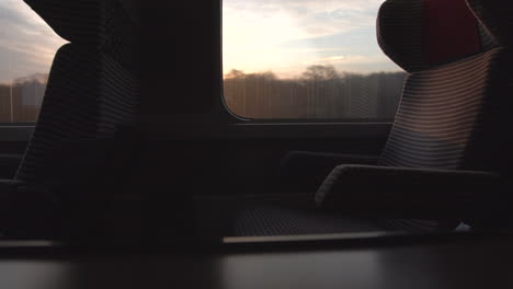 A-beautiful-shot-of-a-sunrise-aboard-a-bullet-train-en-route-to-Paris