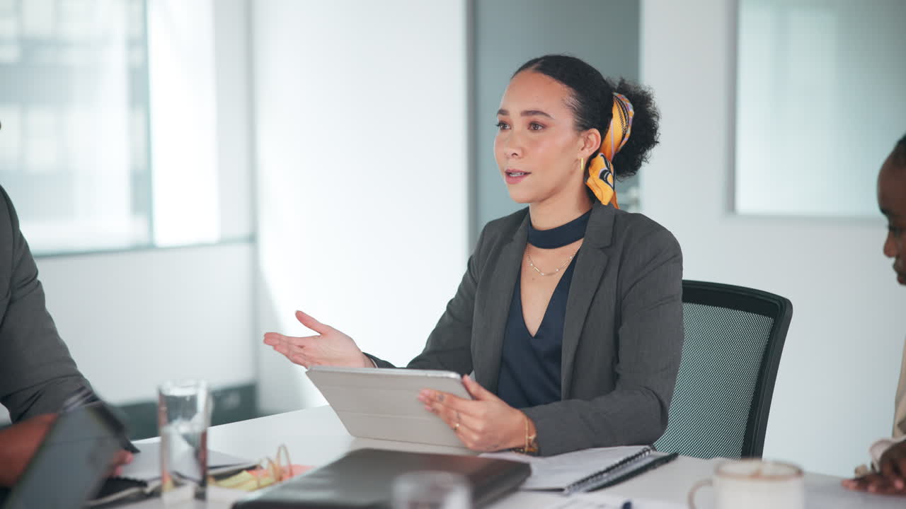 Business meeting with businesswoman using tablet