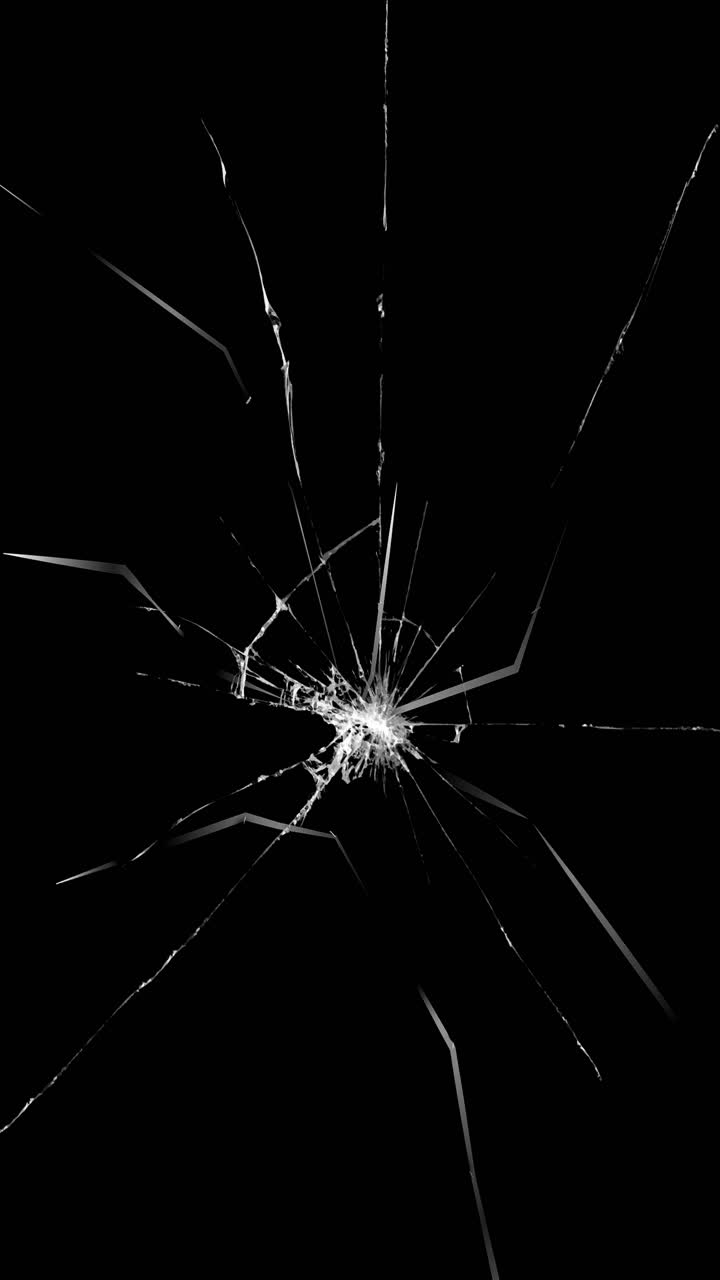 Glass crack impact effect on black background, seamless loop