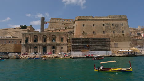 over the water past the walled city of valetta on the island of malta