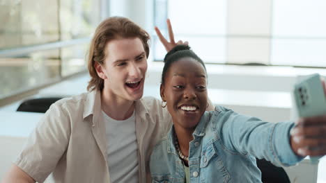 happy friends taking selfie