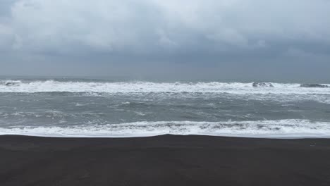 Waves-Crashing-on-Beach-in-Yogyakarta,-Indonesia---Static-Shot-on-Overcast-Day