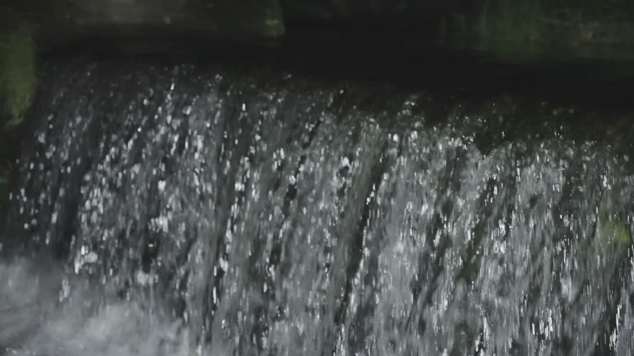 Weir in river in Daisen, Tottori Japan at night, Slow Motion Pan