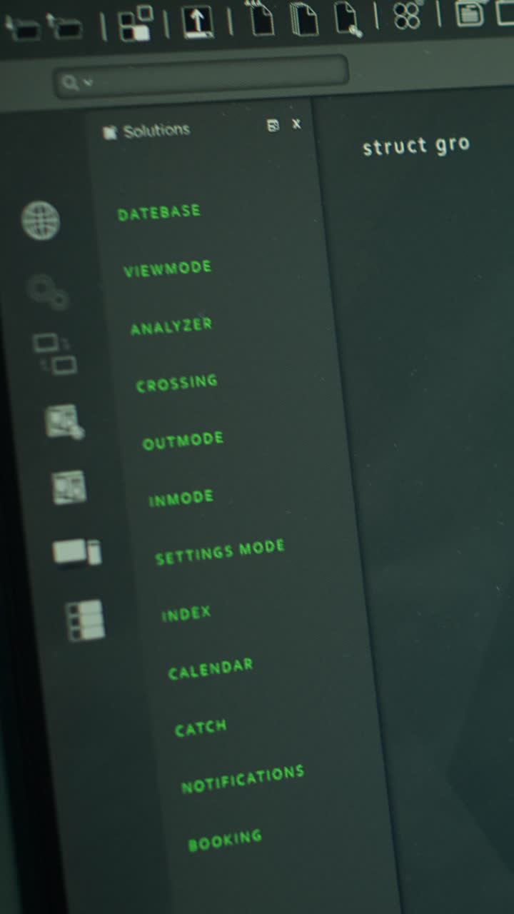 Close-up of Computer Keyboard and Programming Code on Screen