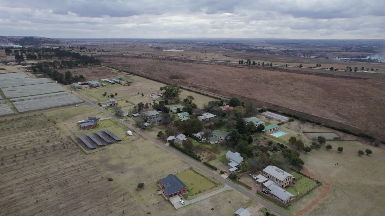 Rural farmlands community - aerial JIB down