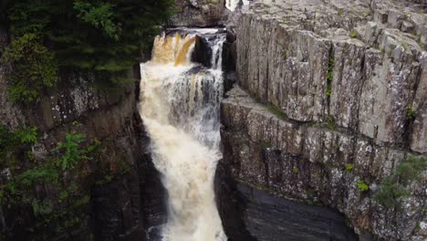 High-Force-Waterfall-in-Middle-in-Teesdale,-County-Durham,-top-down-aerial-4K-HD-Drone-Drop-Down