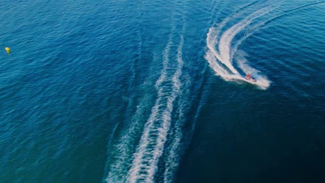 Drone-flying-above-the-coastline-of-Cabopino,-Spain