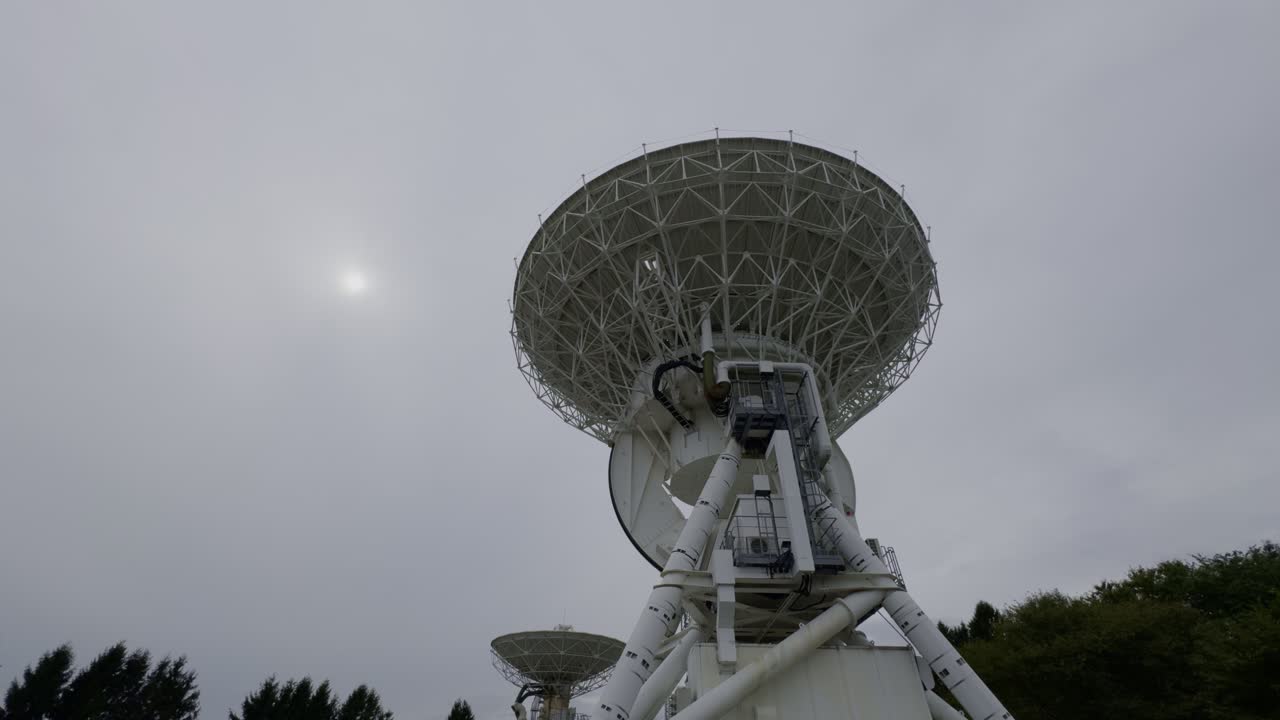 Iwate’s Radio Telescope Under Cloudy Skies A scenic view of the radio telescope in Iwate, Japan, standing tall against the cloudy, moody skies