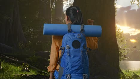 woman hiking in the forest at sunrise