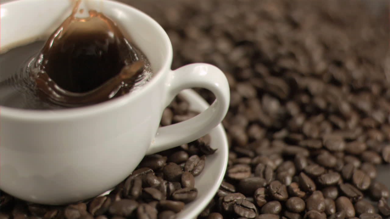 Lump of sugar falling in super slow motion