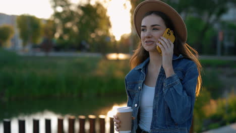 young woman enjoying sunset walk
