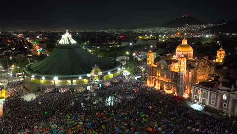 illuminated basilica guadalupe and the barroque of santa maria in mexico - aerial view