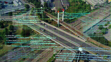 aerial view of highway and railway with programming code overlay animation