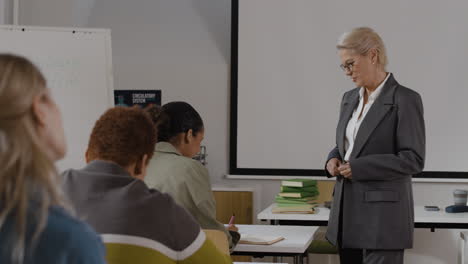 classroom scene with teacher and students